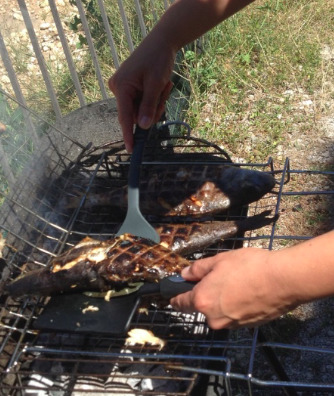 _images/trout_and_sea_bream_remove_from_barbeque.jpg